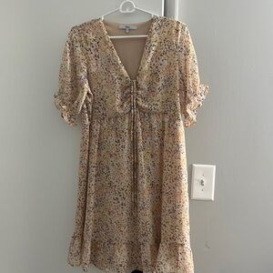 Colorful dot dress with ruffle sleeve at bottom and drawstring chest